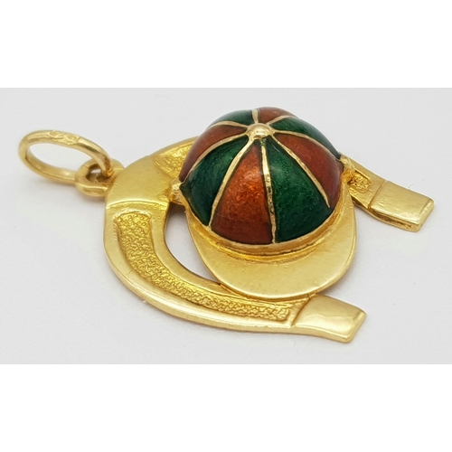 488 - A 9K YELLOW GOLD LUCKY HORSESHOE WITH JOCKEYS CAP ENAMELLED 2.6G TOTAL WEIGHT, 2CM x 2.3CM. Ref: SC ... 