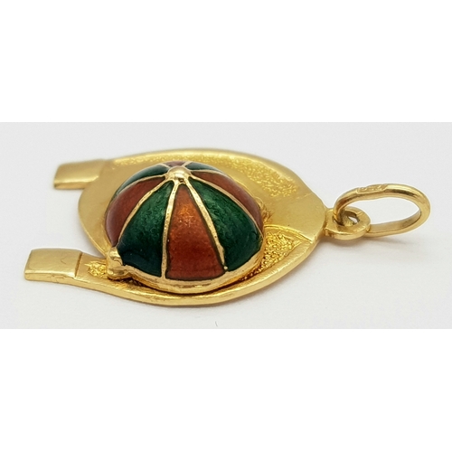 488 - A 9K YELLOW GOLD LUCKY HORSESHOE WITH JOCKEYS CAP ENAMELLED 2.6G TOTAL WEIGHT, 2CM x 2.3CM. Ref: SC ... 