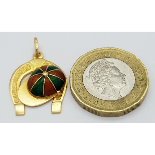 488 - A 9K YELLOW GOLD LUCKY HORSESHOE WITH JOCKEYS CAP ENAMELLED 2.6G TOTAL WEIGHT, 2CM x 2.3CM. Ref: SC ... 