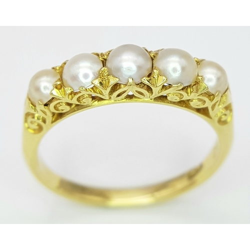 50 - AN 18K YELLOW GOLD FIVE PEARL SET RING, ENGRAVED 1492. 3.3G TOTAL WEIGHT , SIZE L. Ref: SC 4073