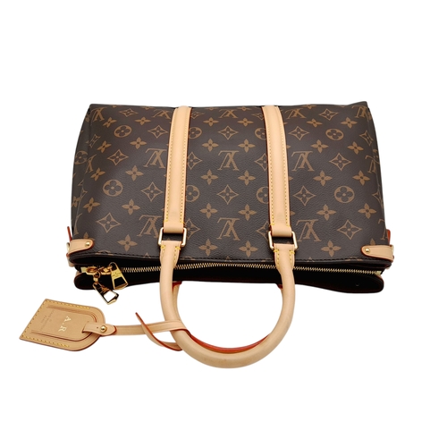 66 - A Louis Vuitton Monogram Canvas Sac Plat Bag. Brown coated canvas exterior with natural leather trim... 