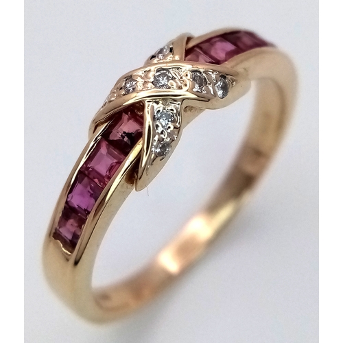 74 - A 14K YELLOW GOLD DIAMOND & RUBY CROSS RING 3.4G TOTAL WEIGHT, SIZE Q 1/2. Ref: 9297