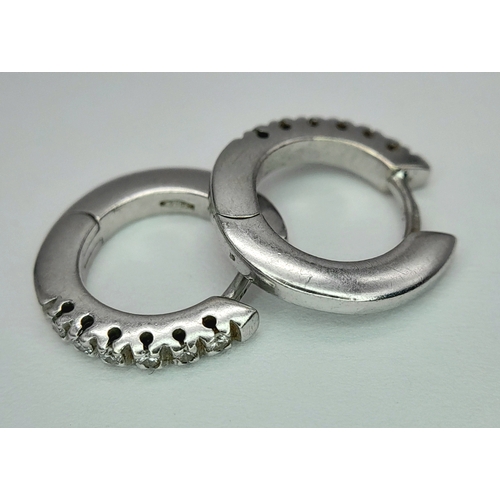 184 - A PAIR OF 18K WHITE GOLD DIAMOND SET MINI HOOP EARRINGS 2.8G , APPROX 1.3CM DIAMETER. Ref: SC 3074