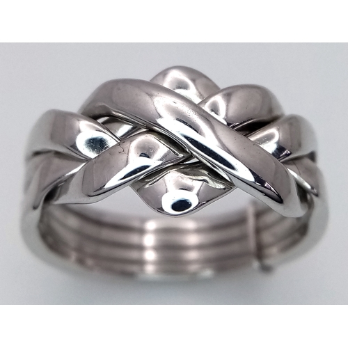 201 - A 9K WHITE GOLD PUZZLE RING 5.4G SIZE M. Ref: 8744