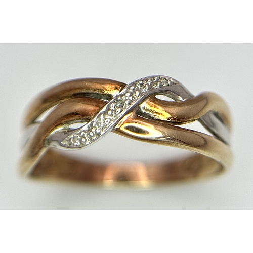 502 - A 9K THREE COLOUR GOLD DIAMOND SET TWIST DESIGN RING. 1.6G TOTAL WEIGHT,  SIZE K. Ref: SC 3001