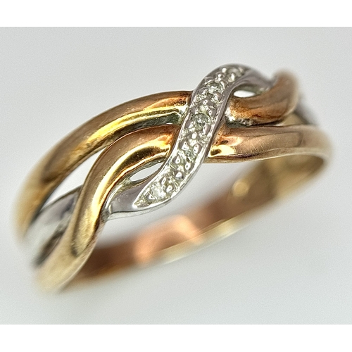 502 - A 9K THREE COLOUR GOLD DIAMOND SET TWIST DESIGN RING. 1.6G TOTAL WEIGHT,  SIZE K. Ref: SC 3001