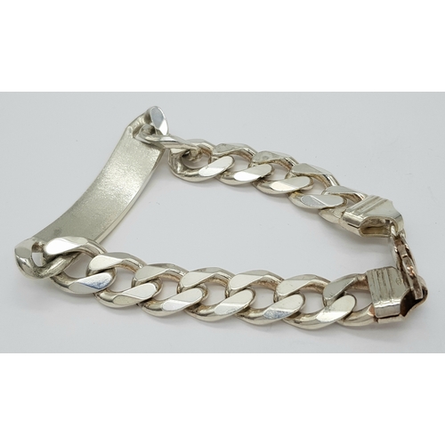 215 - A STERLING SILVER CURB LINK ID BRACELET 64.9G TOTAL WEIGHT, 22CM LENGTH. Ref: TAN 3011