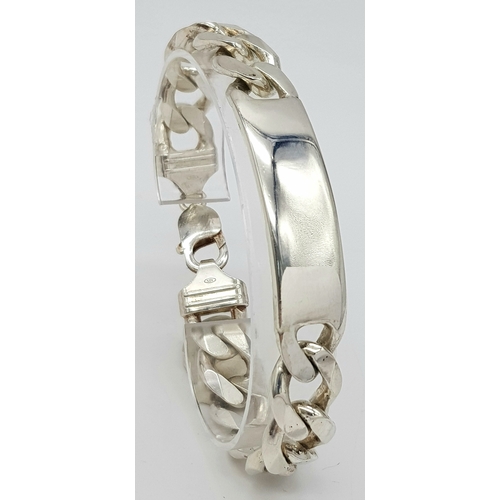 215 - A STERLING SILVER CURB LINK ID BRACELET 64.9G TOTAL WEIGHT, 22CM LENGTH. Ref: TAN 3011