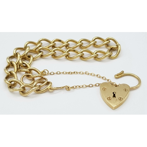 214 - A 9k yellow gold charm bracelet. 15.1g total weight. 18cm total length. 18321-1