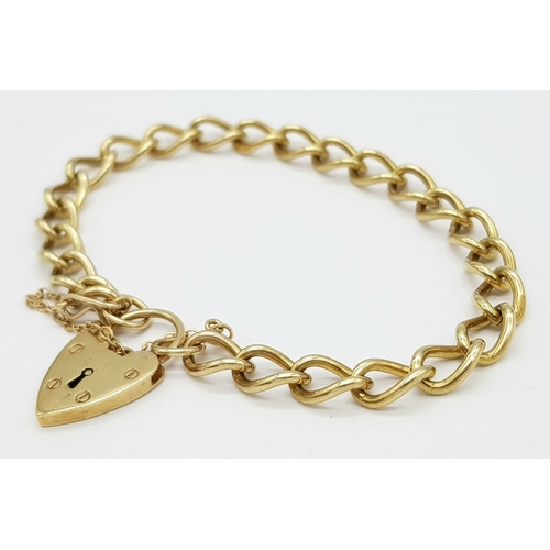 214 - A 9k yellow gold charm bracelet. 15.1g total weight. 18cm total length. 18321-1