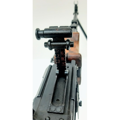 96 - A Soviet RPD Machine Gun with Tripod. This 20 inch barrel, 7.62 calibre weapon was produced between ... 