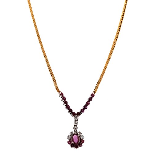 110 - A Breath-Taking 18K Yellow Gold, Pink Garnet and Diamond Lavaliere Necklace. 1.2ctw of round and ova... 