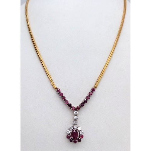 110 - A Breath-Taking 18K Yellow Gold, Pink Garnet and Diamond Lavaliere Necklace. 1.2ctw of round and ova... 