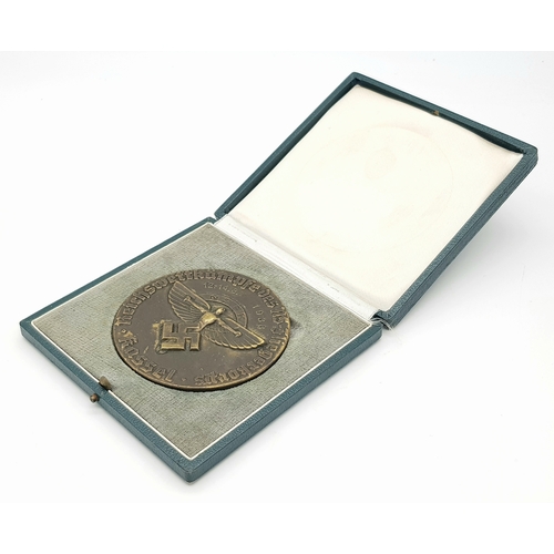 103 - A 1938 German NSFK Cased Bronze Competition Award.