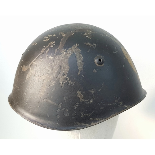 152 - A WW2 Italian Fascist Black shirt M33 Black Helmet with Hand Painted Eagle. With liner and chip stra... 