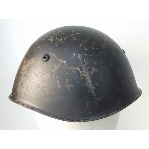 152 - A WW2 Italian Fascist Black shirt M33 Black Helmet with Hand Painted Eagle. With liner and chip stra... 