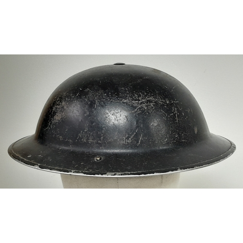 202 - A WW2 1939 Dated British Home Front National Fire Service Mk II Helmet. Nice clean helmet with liner... 