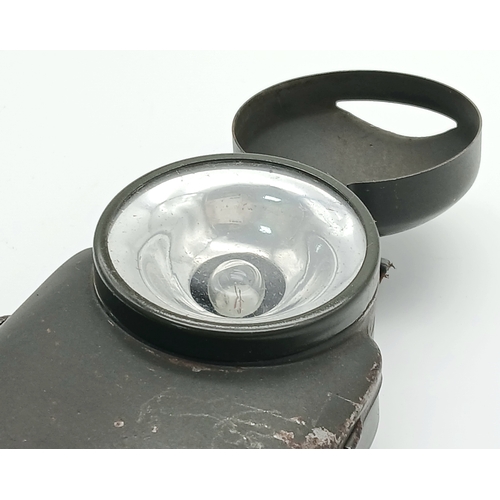 491 - A WW2 German Hassia Wehrmacht Tashchenlampe (Flash Light) with night light restriction cover.