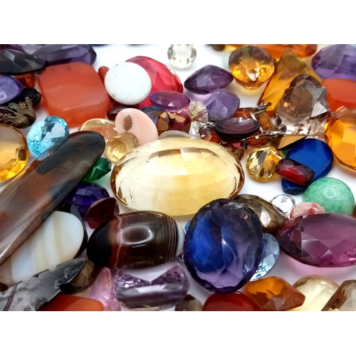 1667 - A Large Collection of Different Coloured and Sized Stones - Some Semi Precious. Perfect for jeweller... 