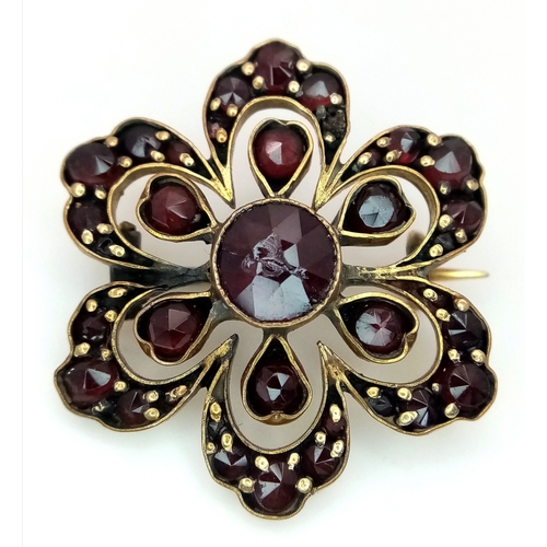 1479 - A Vintage Silver Gilt Bohemian Garnet Set Brooch. The Brooch measures 2.6 Wide.