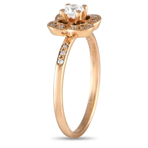 133 - An Mauboussin 18K Rose Gold Diamond Quatrefoil Ring. It features a narrow shank with shoulders punct... 