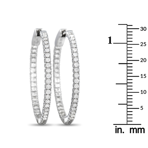 144 - A Pair of 14K White Gold 0.98 ct Diamond Inside-Out Hoop Earrings. The minimalist design allows thei... 