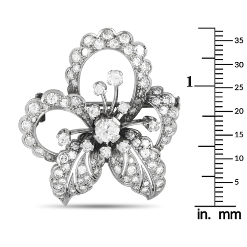 167 - A Platinum 2.80ct Diamond Brooch. Crafted with a Platinum setting, this antique brooch will add opul... 