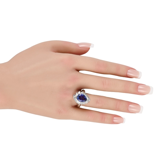 182 - A Platinum 1.35ct Diamond and Tanzanite Ring. A ring that's bound to catch eyes and compliments. Cra... 