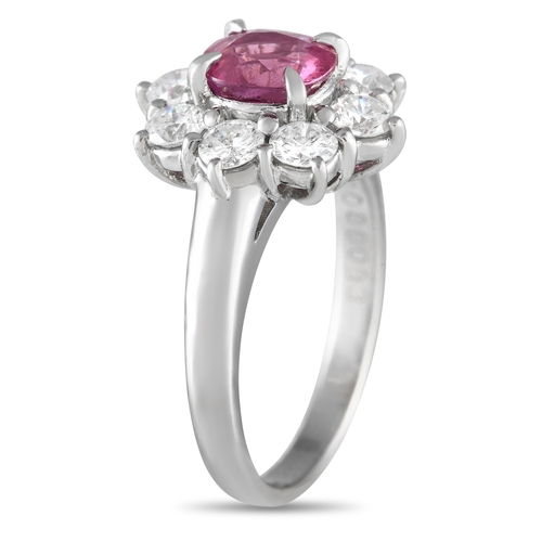 191 - A Platinum 0.83ct Diamond and Ruby Flower Ring. This piece is exquisitely fashioned in enduring plat... 