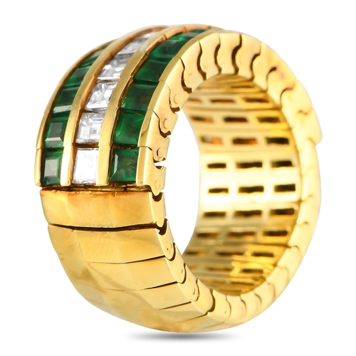 220 - An 18K Yellow Gold 1.0ct Diamond and Emerald Ring. This eye-catching piece in yellow gold features a... 