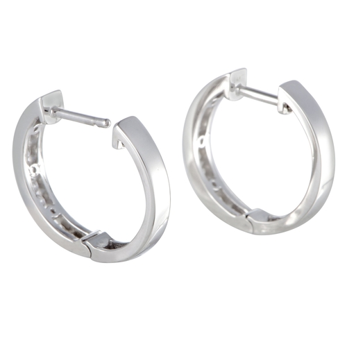 259 - A Pair of 14K White Gold 0.50ct Diamond Hoop Earrings. Exceptionally stylish, charmingly feminine an... 