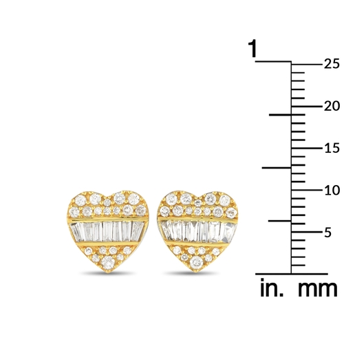 265 - A Pair of 14K White and Yellow Gold 0.35ct Diamond Heart. These heart-shaped earrings will continual... 