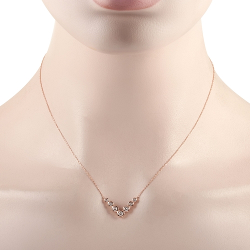 280 - A 14K Rose Gold 0.50 ct Diamond Pendant Necklace. This necklace is made of 14K rose gold and embelli... 