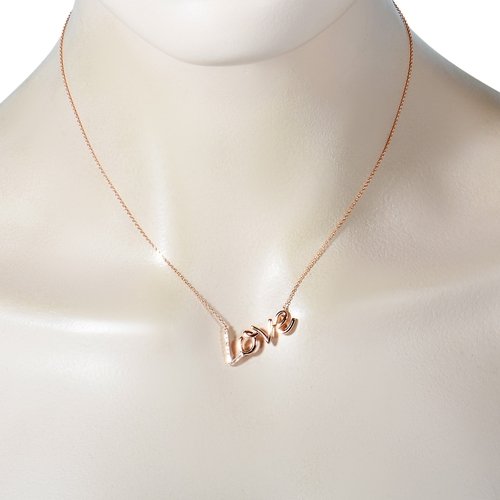 282 - A 14K Rose Gold 0.10 ct Diamond Love Pendant Necklace. This necklace is made of 14K rose gold and em... 