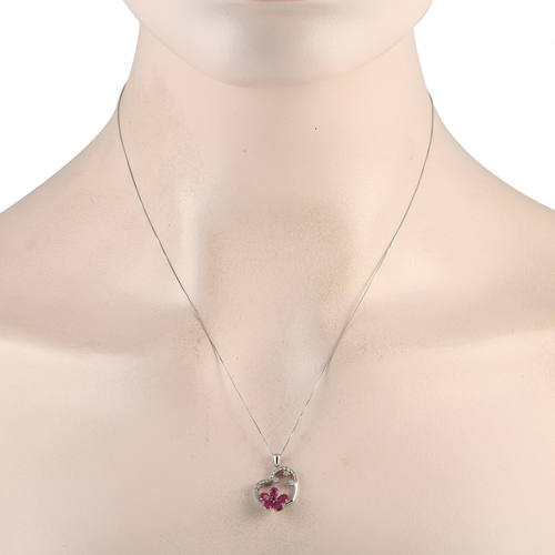 287 - A 14K White Gold 0.20ct Diamond and Ruby Heart and Flower Pendant Necklace. A heart-shaped pendant m... 