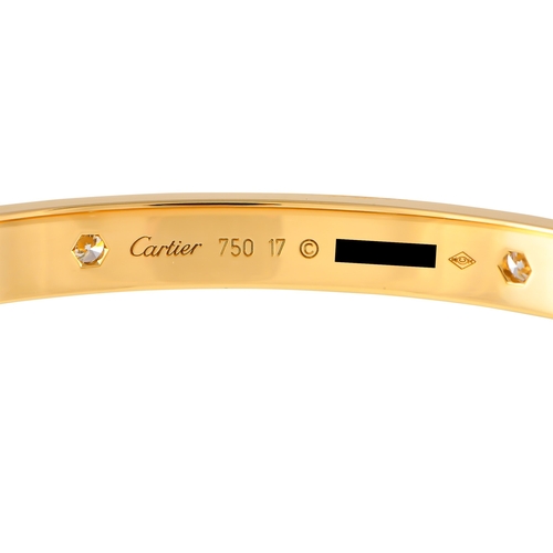 58 - A Cartier LOVE 18K Yellow Gold 4 Diamond Bracelet Size 17. A timeless piece from Cartier, this LOVE ... 