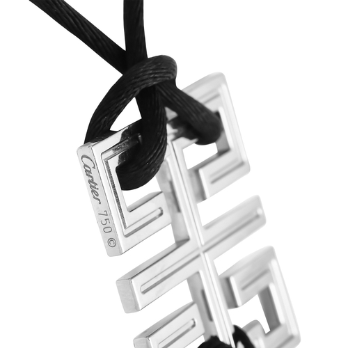 68 - A Cartier Le Baiser du Dragon 18K White Gold Pendant Necklace. Suspended from a 24cm black silk cord... 