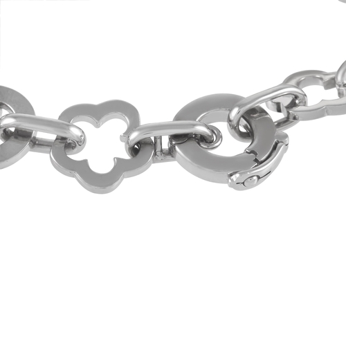 82 - A Chanel Camelia 18K White Gold Four Charm Bracelet. The bracelet is made up of alternating floral a... 