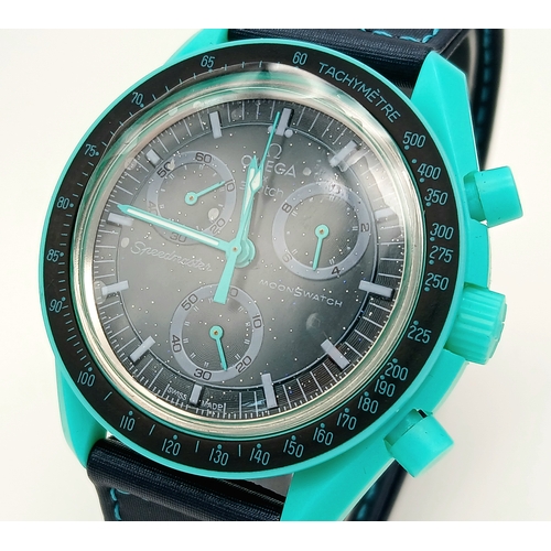 1266 - A Limited Edition Swatch Omega ‘Mission on Earth-Polar Lights’ Bioceramic Moonswatch. 40mm Case. Com... 