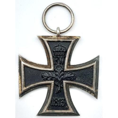 118 - An Iron Cross Second Class 1914. Black and white ribbon. Fitted box. Makers mark of S.W. Iron Core.