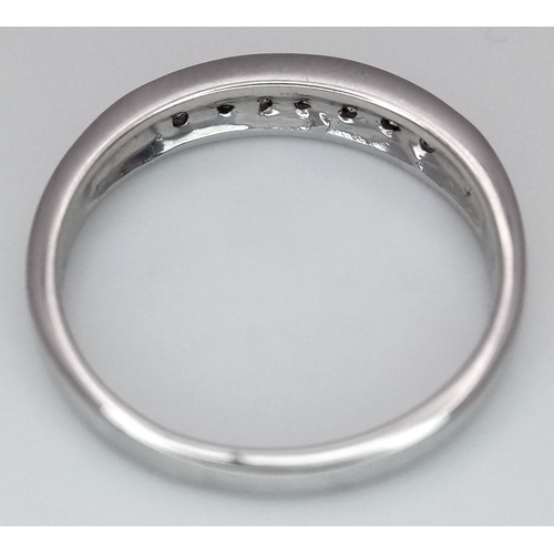 142 - AN 18K WHITE GOLD DIAMOND HALF ETERNITY RING 0.35CT , 2.5G TOTAL WEIGHT, SIZE L 1/2. Ref: SC 4051