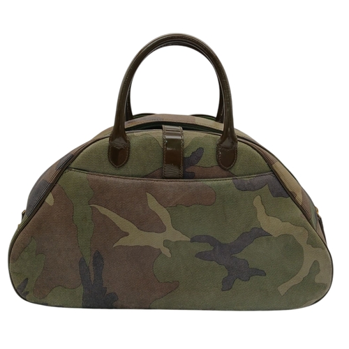 213 - A Christian Dior Camouflage Boston Bag. Olive green canvas exterior with leather trim, gold-toned ha... 