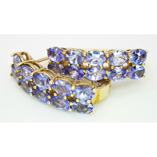 278 - A PAIR OF 9K YELLOW GOLD TANZANITE SET EARRINGS - 4.1G TOTAL WEIGHT. JB7100