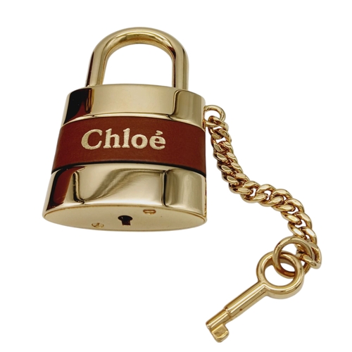 312 - A Chloé Brown Aby Lock Bag. Brown leather exterior with green and orange leather panels, gold-toned ... 