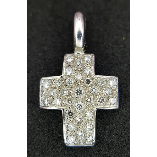 460 - AN 18K WHITE GOLD DIAMOND SET CROSS 0.40CT , 1.8G TOTAL WEIGHT, 1CM x 2CM. Ref: SC 4056