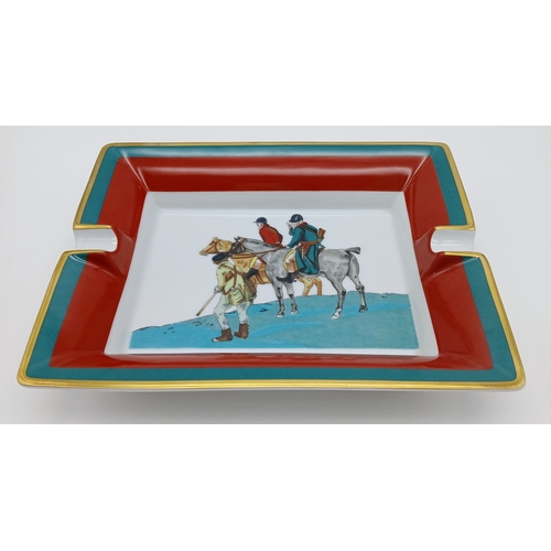 487 - An Hermès Porcelain Ashtray. Porcelain ashtray featuring an equestrian-themed illustration with two ... 