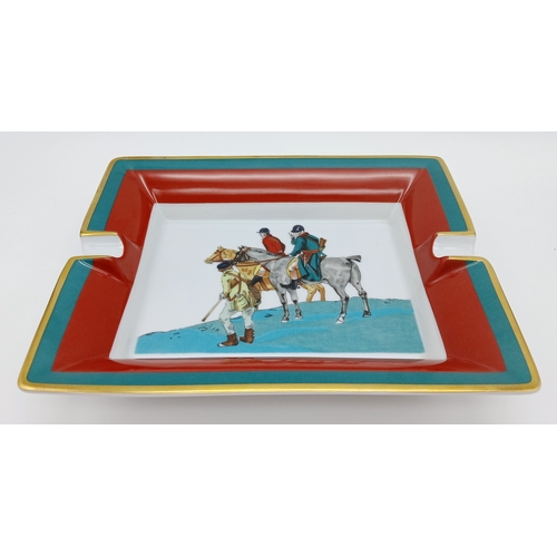 487 - An Hermès Porcelain Ashtray. Porcelain ashtray featuring an equestrian-themed illustration with two ... 