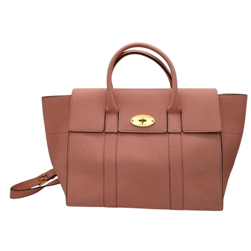 494 - A Mulberry Pink Leather Bayswater Bag. Pink leather exterior with gold-toned hardware, magnetic clos... 