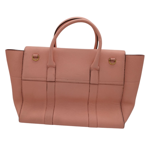 494 - A Mulberry Pink Leather Bayswater Bag. Pink leather exterior with gold-toned hardware, magnetic clos... 