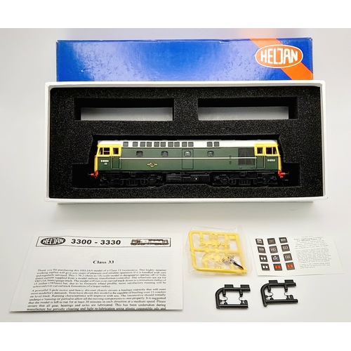 1164 - A Heljan Model Class 33 Locomotive - 3310. Green with yellow ends. In excellent condition. Unused, i... 